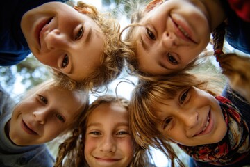 Happy kids huddling portrait children smiles.