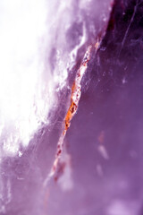 Beautiful close up of quartz crystal rock shard with reflective rainbow spiritual light