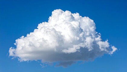 Fluffy cumulus cloud against vivid blue sky