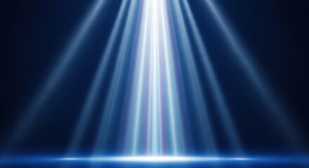 Beams of blue and white light shine brightly against a dark starry backdrop