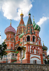 View of the Kremlin from the Bolshoy Moskvoretsky Bridge with flowers on a clear sunny day, Moscow.  Sights of Russia. Architecture of World tourism.