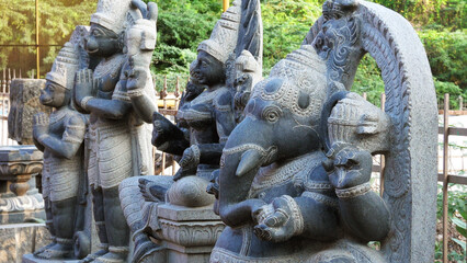 A street shop in Mahabalipuram (Mamallapuram), Tamil Nadu, India displaying carved stone statues