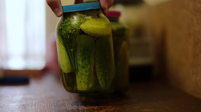 Discover the art of home pickling cucumbers in a cozy kitchen setting