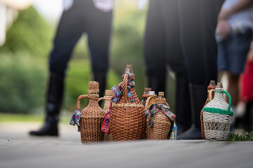A Slov&aacute;cko demijohn is a traditional glass container, often braided with a rod, used for storage and decoration. In the Slov&aacute;cko region, it is associated with the production of fruit spirits, especial