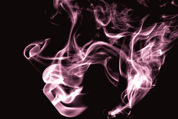 Colorful abstract smoke swirls isolated on black
