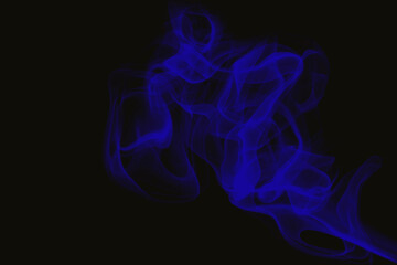 Fototapeta premium Vivid blue smoke swirls on black background