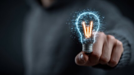 Person holds glowing lightbulb filled with binary code and orange filaments