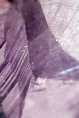 Beautiful close up of quartz crystal rock shard with reflective rainbow spiritual light