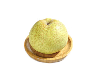 Fresh Anhui Dangshan tribute pear on wooden plate against white background for display or culinary presentation