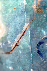 Beautiful close up of quartz crystal rock shard with reflective rainbow spiritual light