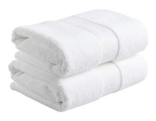 Soft, fluffy white towels stacked neatly, conveying a sense of cleanliness and comfort.