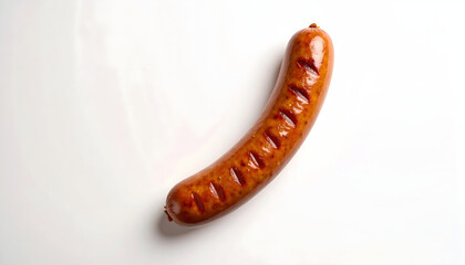 A single long sausage, cooked to a crispy golden brown, placed on a clean white surface with a juicy interior visible