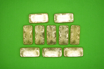 Gold bars, gold color, containing 96.5 percent gold.