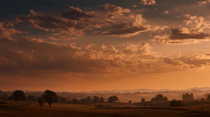 Scenic Landscape Sunset Sky with Clouds Over Open Field and Distant Trees