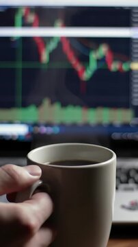 Tense investor grips hot coffee mug, knuckles white, intently watching volatile altcoin chart flicker on laptop screen, capturing market anxiety.