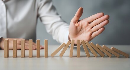 concepts of risk management, problem-solving, crisis intervention, or preventing a negative outcome. It visually conveys the idea of stopping a destructive process before it can cause further damage.