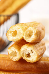 Crispy fritters served for a traditional breakfast at a cozy cafe in the morning light