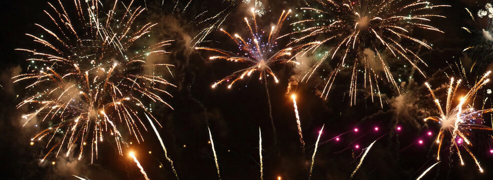 Banner Colorful vibrant Firework celebrate anniversary happy new year 2025, 4th of july national holiday festival. Banner gold red green pink firework night. countdown new year 2026 copy space