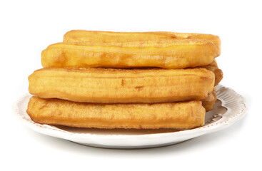 Crispy big fries served on a white plate for a gourmet traditional breakfast experience