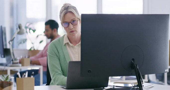 Laptop, business woman and annoyed with research, coworking or creative project in journalism. Copywriter, technology and serious for online article, blog or review information for story feedback