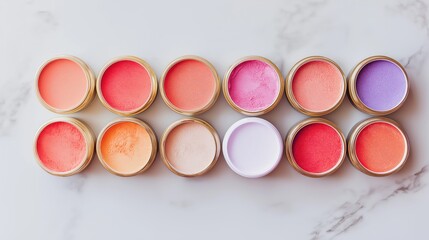 Top View of Colorful Blush Powders – Luxury Cosmetic Flatlay on White Marble Slab