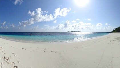 Fototapeta premium Beautiful sandy beach with white sand and rolling calm wave of turquoise ocean on Sun