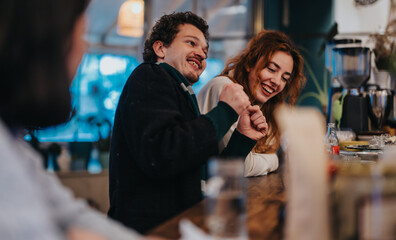 Group of friends laughing and interacting at a cozy bar, creating a cheerful and engaging...