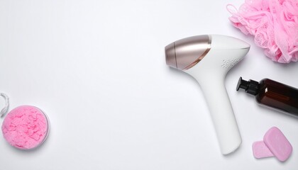 Modern laser epilator with bath accessories on white background.
