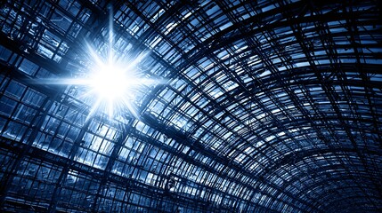 Detailed view of a vast, arched, glass-roofed structure.