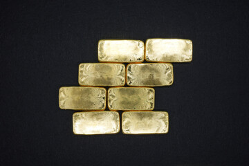 Gold bars, gold color, containing 96.5 percent gold.