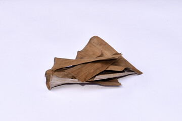 Banana leaves (Musa paradisiaca L) on white background, Dry leaves