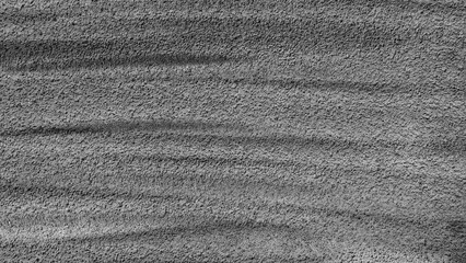 gray background, photo shows concrete wall texture and paint lines