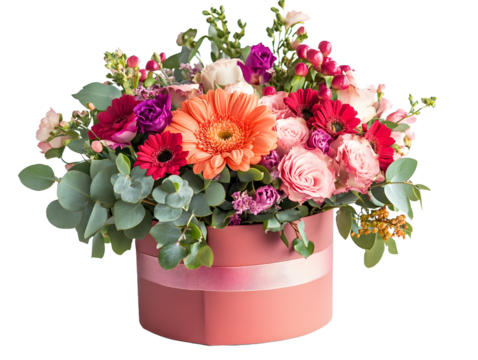 Vibrant mixed flower arrangement in a pink hat box with a ribbon isolated on transparent background