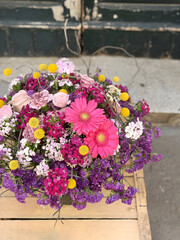 bouquet of flowers on wooden background