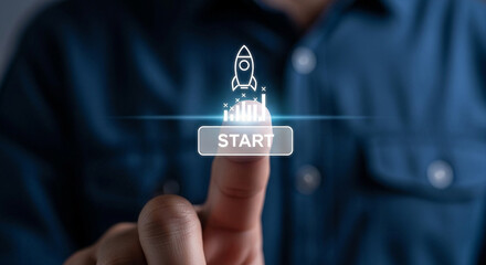 Man pressing start button launching rocket, business startup and innovation concept