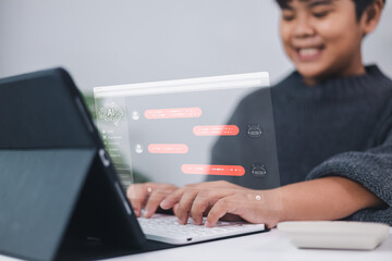 Artificial intelligence AI transforms learning as a young boy interacts with a holographic chatbot on a laptop, symbolizing digital literacy, innovation, and the future of education.