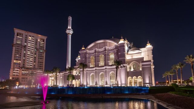 Night time lapse clip of of Hamad Bin Jassim Mosque on the Pearl Island in Doha, Qatar