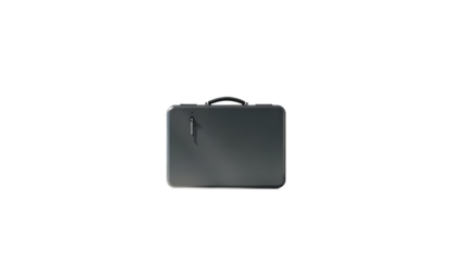 A centered view of a dark gray hard shell suitcase with a handle on a black background in studio light