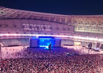 People at the concert stadium of famous singer