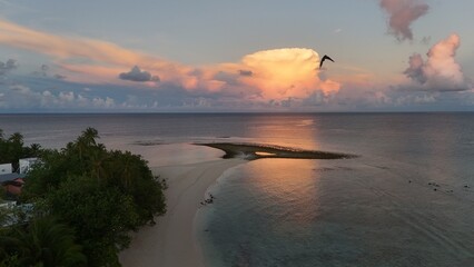 Fototapeta premium Aerial Paradise in the Maldives – Crystal Clear Water, Islands & Overwater Bungalows