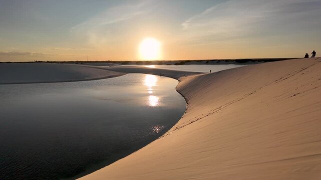 Lencois Maranhenses In Santo Amaro Maranhao Brazil. Natural Freshwater Lagoon Nestled Between White Sand Dunes. Sunset City Seaside. Coast Outdoors Panning Wide. Santo Amaro Maranhao.
