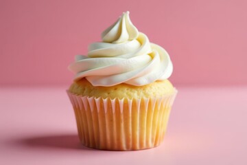 Fluffy vanilla cupcake topped with swirl of buttercream frosting , cake, gourmet, top view