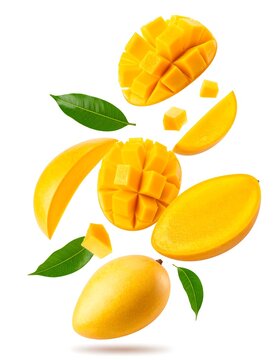 Vibrant Yellow Mango Slices and Cubes Floating Against White Background
