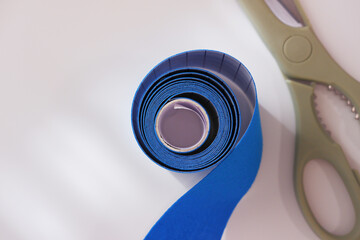 Elastic kinesiology tape roll for physiotherapy and sports injuries