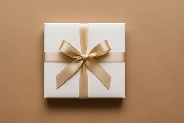 Blank gift box with ribbon on kraft paper background, elegant packaging mockup