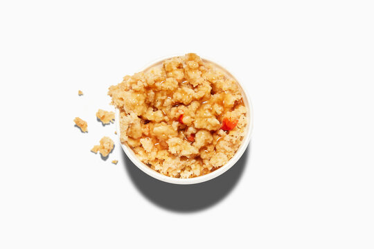 Stuffing with gravy in white bowl isolated on white background