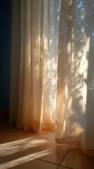 Sunlight through sheer curtains casting shadows on tiled floor indoors