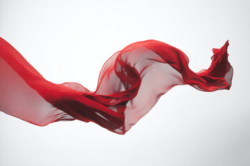 a woman in a red dress is flying through the air