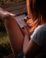 young woman working on drawing