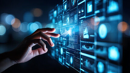 Human hand interacting with futuristic digital interface displaying charts and data technology